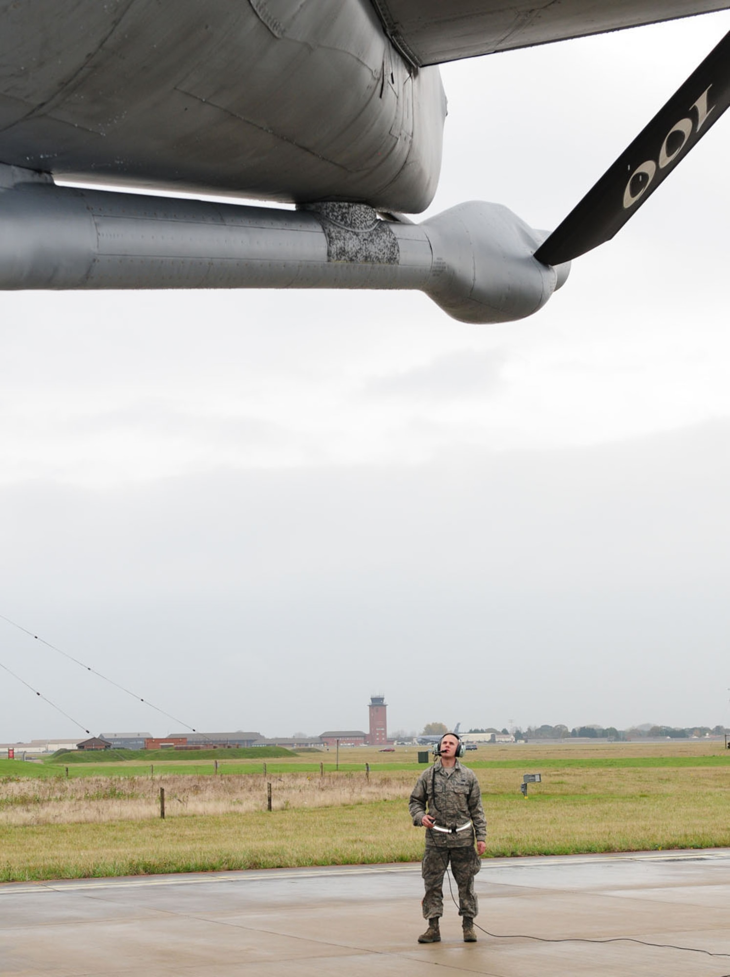 RAF MILDENHALL, England -- Airman 1st Class Robert Calise, 100th Aircraft Maintenance Squadron APG, performs safety checks on a KC-135 Stratotanker Nov. 9, 2011, as the aircrew perform their preflight checks. Made up of three career fields – crew chiefs, hydraulics and propulsion specialists – APG formerly meant “airplane general,” and though the name is no longer officially used, it’s still kept for its historical roots. Crew chiefs from APG inspect high-fail points on every aircraft, including flaps, spoilers, tracks, gears and gear doors. They launch eight to nine jets every day and perform recoveries and inspections, as well as marshal the jets for takeoff and again on landing. (U.S. Air Force photo/Karen Abeyasekere)