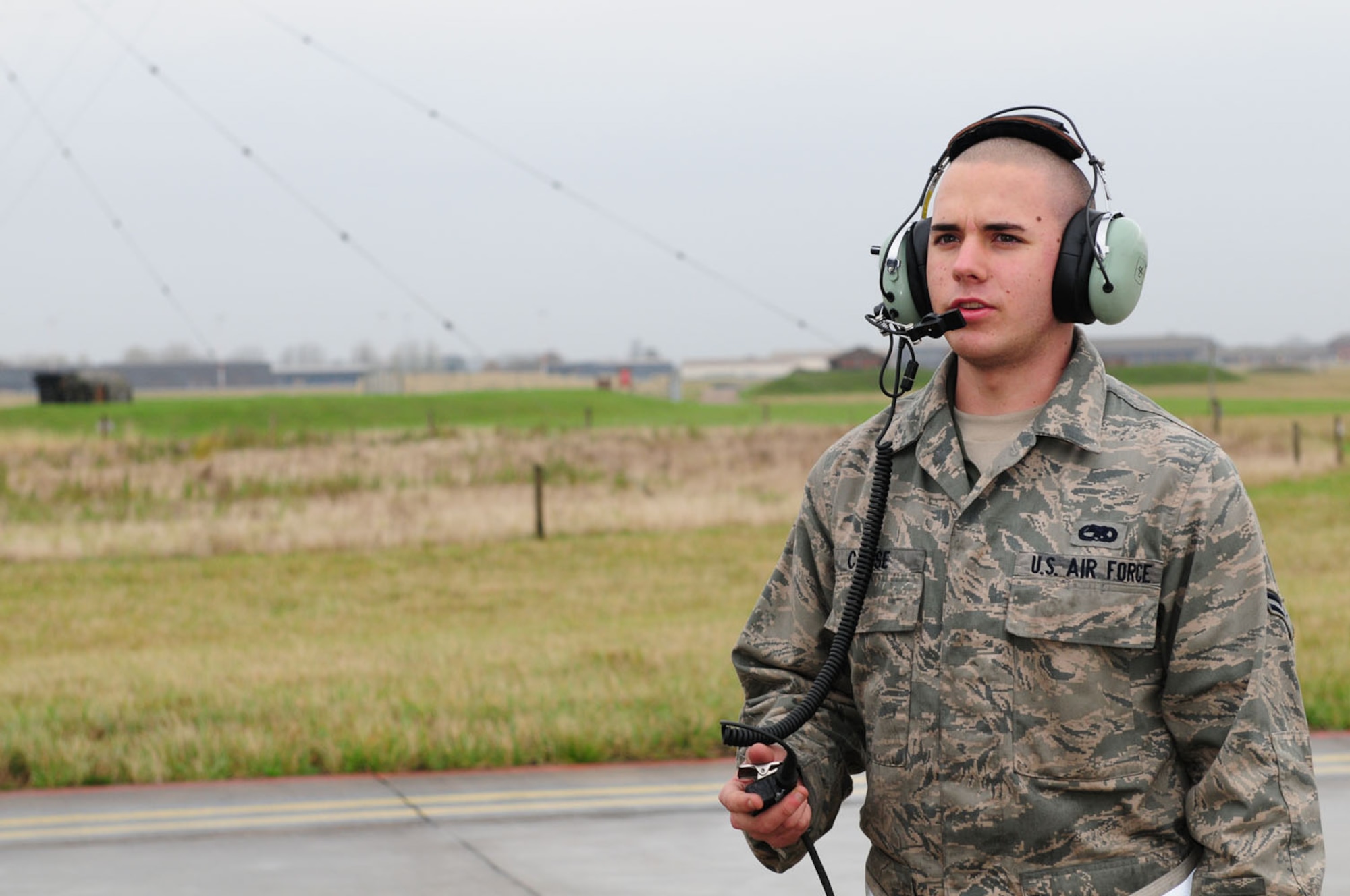 RAF MILDENHALL, England -- Airman 1st Class Robert Calise, 100th Aircraft Maintenance Squadron APG, performs external preflight checks leading up to the takeoff of a KC-135 Stratotanker here Nov. 9, 2011. Made up of three career fields – crew chiefs, hydraulics and propulsion specialists – APG formerly meant “airplane general,” and though the name is no longer officially used, it’s still kept for its historical roots. Crew chiefs from APG launch and recover jets from RAF Mildenhall. They are responsible for the jet from touchdown to takeoff, after which the aircrew take over responsibility. Four hours prior to launching a jet, they start doing internal and external checks, ensuring the aircraft is mission-ready. (U.S. Air Force photo/Karen Abeyasekere)