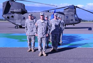 Lt. Col. Michael Breslin, commander of 1st Battalion, 228th Aviation Regiment, presides over the Bravo Company’s change of command ceremony Nov. 22, 2011 at Soto Cano Air Base, Honduras. Members of the company stood in formation as Colonel Breslin said goodbye to their outgoing commander, Capt. Mark Cleary, and hello to their new one, Capt. Balint Simsik. (U.S. Air Force photo/Capt. Candice Allen)