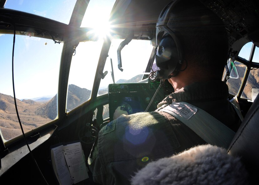 Col. Dan Dagher, 317th Airlift Group commander, flies a C-130 J-model during an airlift group exercise Nov. 22, 2011 in Abilene, Texas. Conducting exercises ensures airmen are capable of bringing support to foreign land. (U.S. Air Force photo by Airman 1st Class Jonathan Stefanko/ Released) 