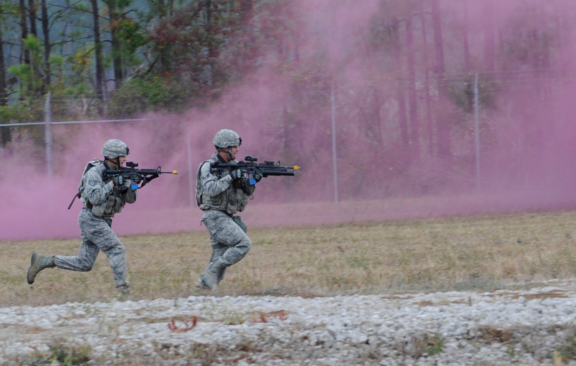 Members of the 509th Security Forces Squadron participate in phase one, the bounding over watch, of the mental and physical challange during the second annual Global Strike Challenge Nov. 7, 2011, at Camp Minden. The competition includes security forces and missile and bomber forces from Air Force Global Strike Command. The teams have the opportunity to participate in innovative thinking, teamwork and esprit de corps that are essential to the mission. (U.S. Air Force photo/Staff Sgt. Alexandra M. Boutte) 
