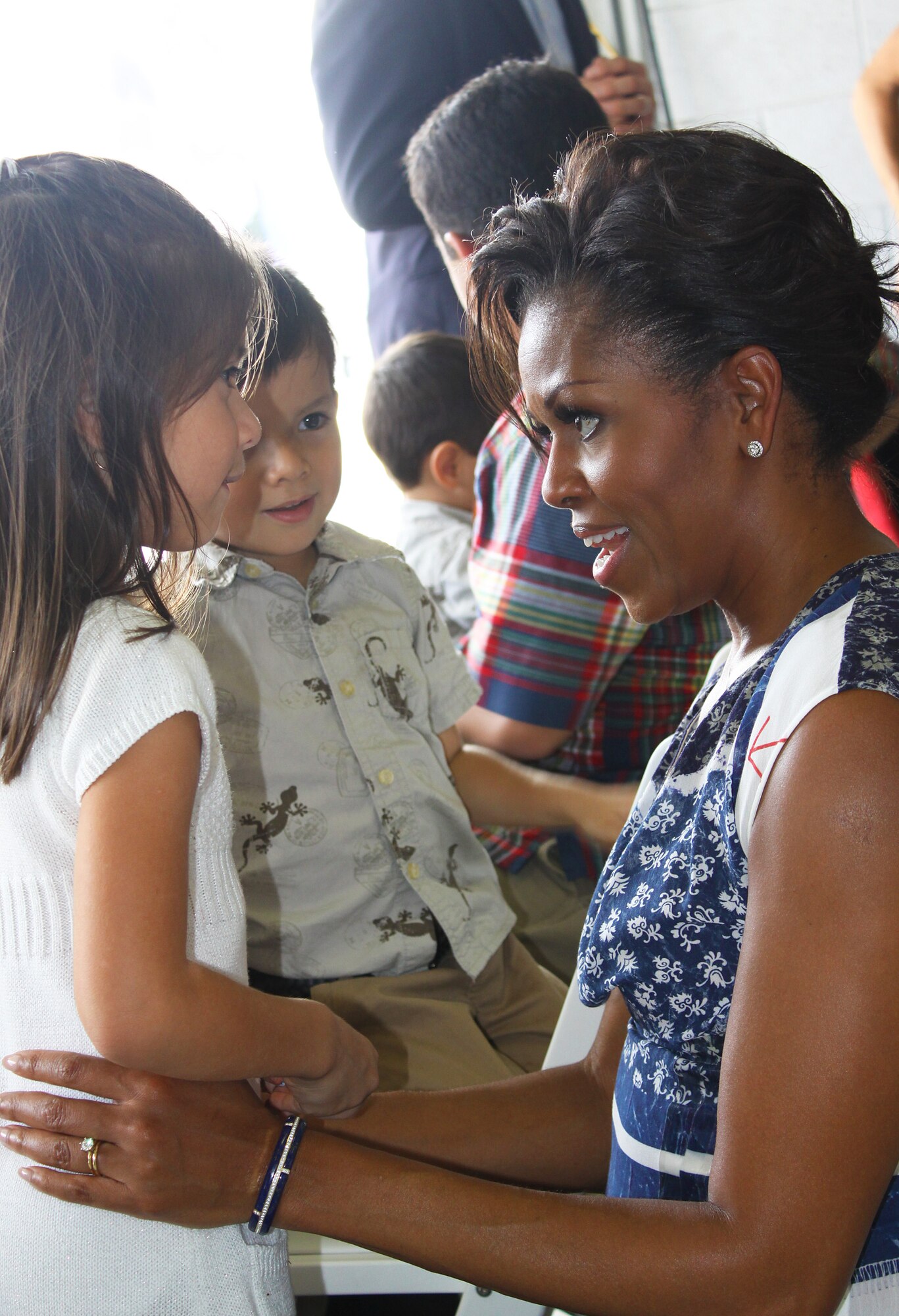 First Lady Michelle Obama greets military and family members from Homstead Air Reserve Base during the the NASCAR Sprint Cup Series Ford 400 on Nov. 20. (U.S. Air Force/Senior Airman Lou Burton)