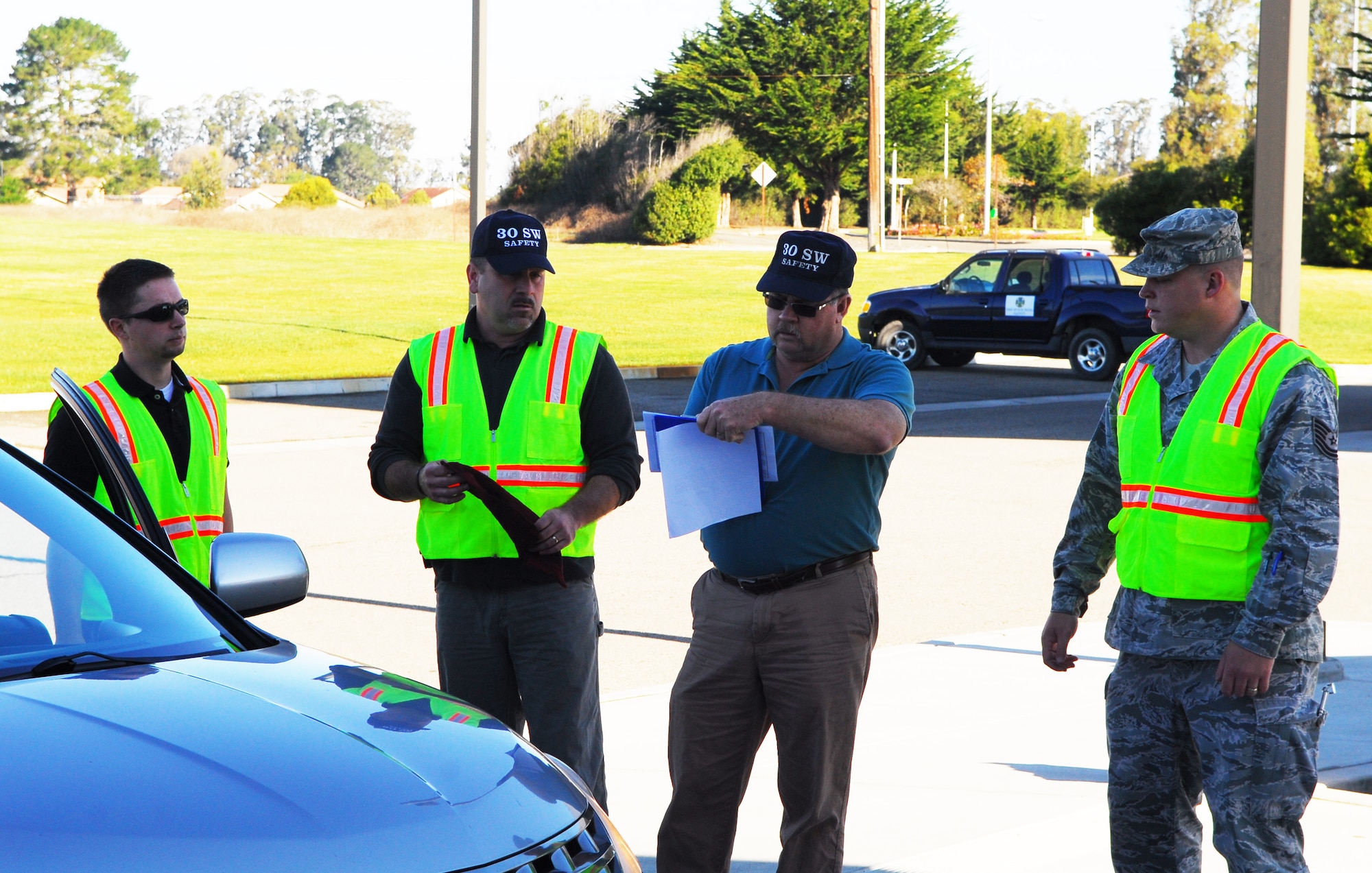 VANDENBERG AIR FORCE BASE, Calif. – Members of the 30th Space Wing Safety Office prepare to administer free vehicle safety checks at the Army and Air Force Exchange Service Car Care Center’s parking lot here Wednesday, Nov. 23, 2011. (U.S. Air Force photo/Senior Airman Steve Bauer)    
