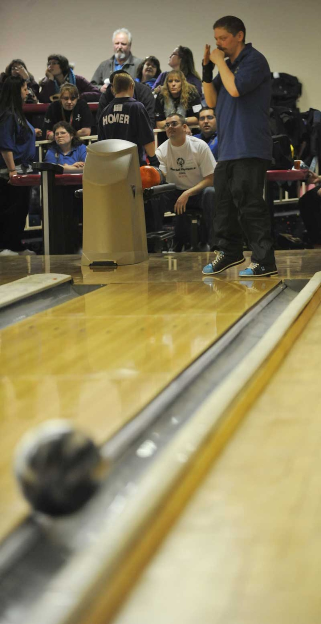 Special Olympics bowler Zac Pennington cringes over having thrown a gutter ball at the Polar Bowl on Sunday.  (U.S. Air Force photo/Airman 1st Class Ty-Rico Lea)