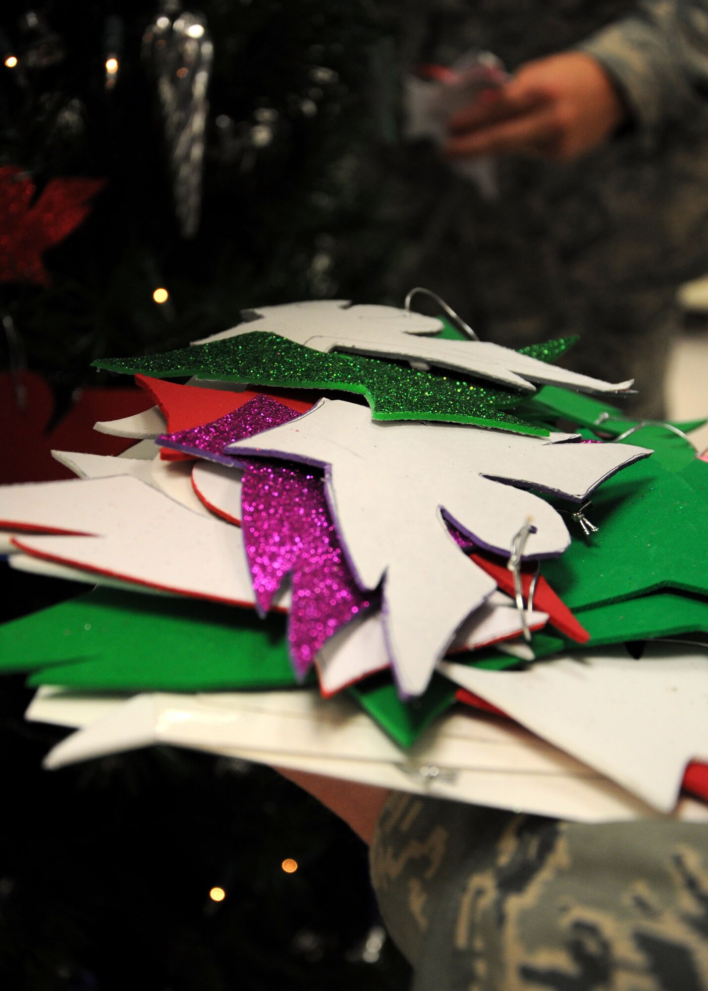 GOODFELLOW AFB, Texas – Handmade angels used to kick off the Angel Tree Project at the Base Exchange Nov. 22. This is a program where people can pick an angel off the Christmas Tree, buy a gift card of any amount and give it to customer service to give to the First Sergeants Council. The cards are then distributed along with the food baskets the week prior to Christmas. (U.S. Air Force photo/ Staff Sgt. Tong Duong)