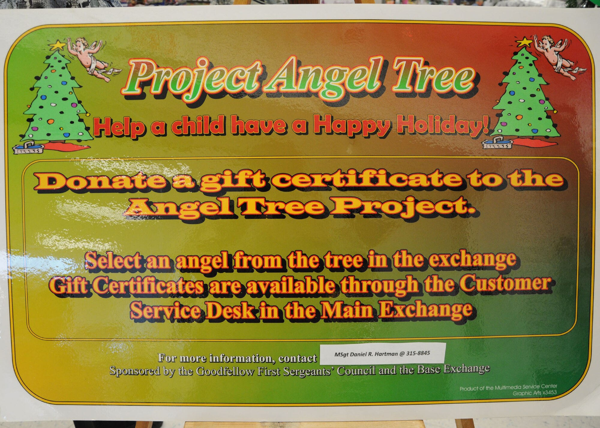 GOODFELLOW AFB, Texas – The Angel Tree Project at the Base Exchange is a program where people can pick an angel off the Christmas Tree, buy a gift card of any amount and give it to customer service to give to the First Sergeants Council. The cards are then distributed along with the food baskets the week prior to Christmas. (U.S Air Force photo/ Staff Sgt. Tong Duong)
