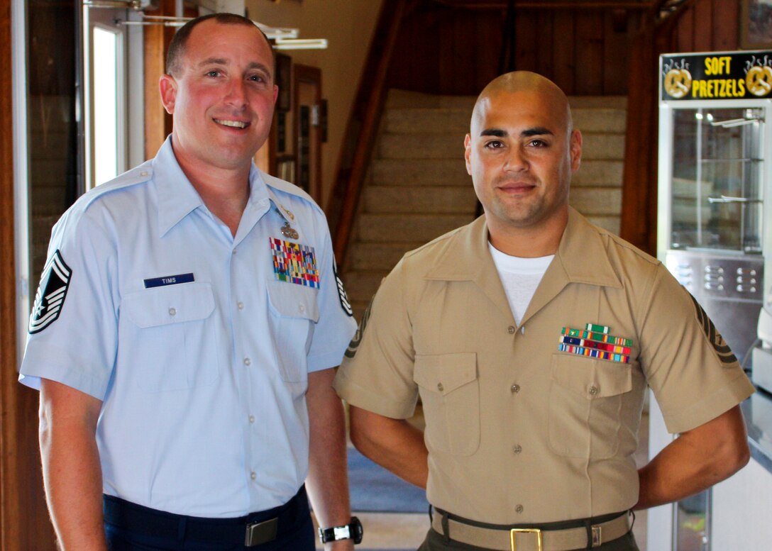 Senior Master Sgt. Bruce Tims, of the 919th Operations Support Squadron, stands with Gunnery Sgt. James Bautista after his graduation from the Marine Corps Staff NCO Academy, Advanced Course at Camp Lejeune, N.C. Oct. 14.  Tims was the first Air Force reservist to graduate the Marine leadership course. (Courtesy photo)