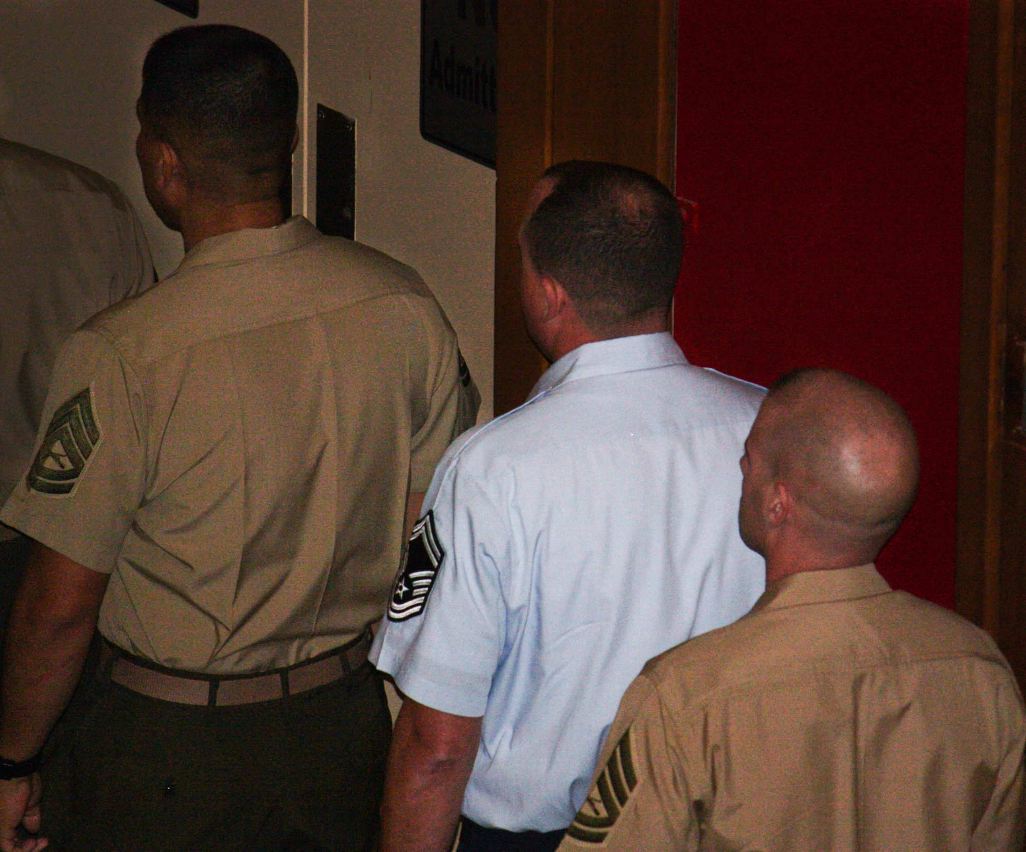 Senior Master Sgt. Bruce Tims, of the 919th Operations Support Squadron, waits with his fellow Marines to accept his certificate of training at his graduation from the Marine Corps Staff NCO Academy, Advanced Course at Camp Lejeune, N.C. Oct. 14.  Tims was the first Air Force reservist to graduate the Marine leadership course. (Courtesy photo)