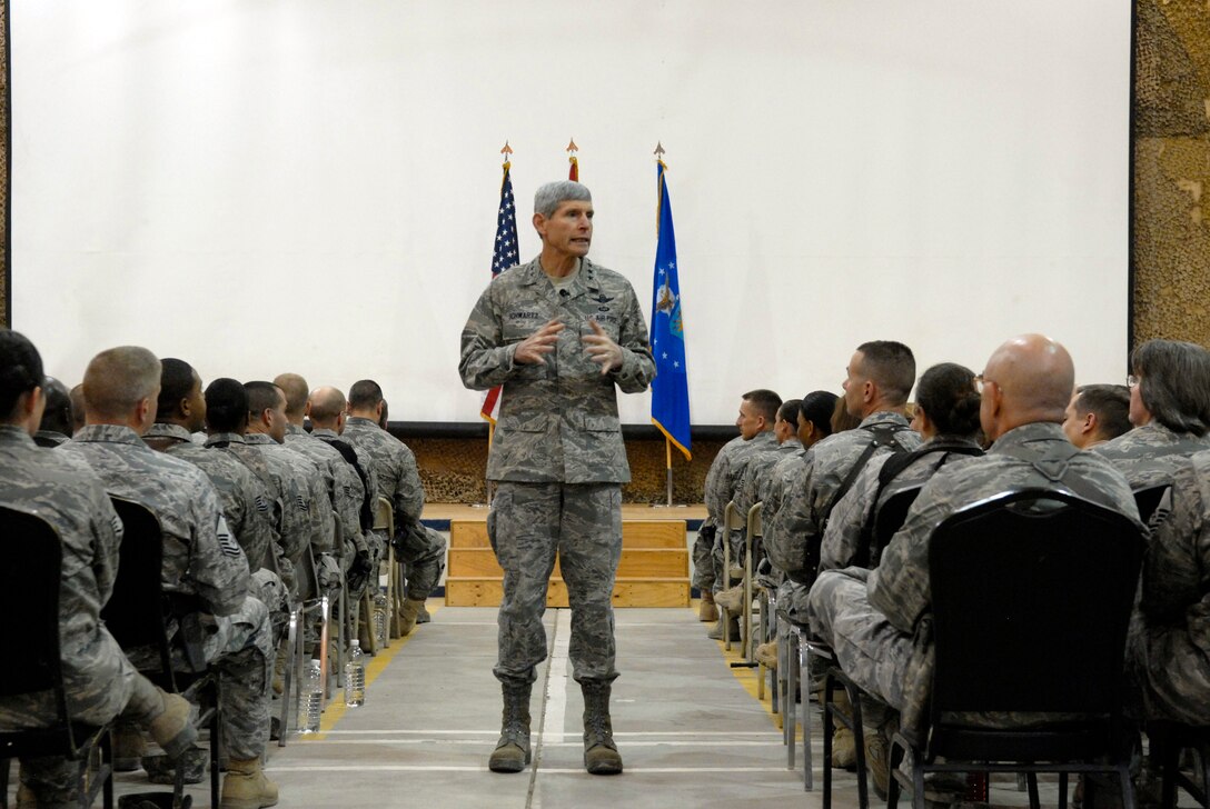 Air Force Chief of Staff Gen. Norton Schwartz talks with Airmen  Nov. 17, 2011, during an all call at Sather Air Base, Iraq. Schwartz held an all call for Sather Airmen and talked about the importance of teamwork. He explained how it has helped Airmen successfully accomplish their mission as part of Operation New Dawn and support the joint mission in Iraq over the last eight years. Schwartz visited Airmen throughout the U.S. Central Command area of responsibility in conjunction with attending the Dubai International Air Chiefs Conference. During his trip to Iraq, Schwartz met with Airmen at Sather Air Base and FOB Union III, as well as with U.S. and Iraqi leaders. (U.S. Air Force photo/ Master Sgt. Kerry Jackson) 