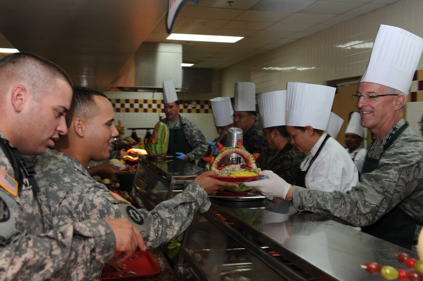 SOTO CANO AIR BASE, Honduras - Gen. Douglas Fraser, commander of U.S. Southern Command, served JTF-Bravo servicemembers a holiday meal, thanked them for their service and wished them a happy Thanksgiving holiday Nov. 24. (U.S. Air Force photo/Tech. Sgt. Matthew McGovern)