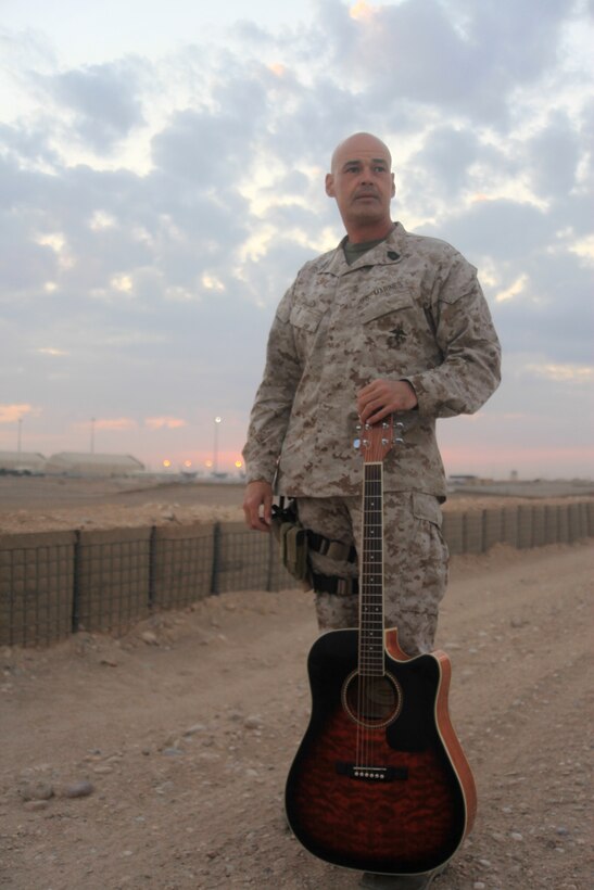 Master Sgt. Robert Allen, a native of Pawnee, Okla., serves as the aircraft rescue firefighting chief for Marine Wing Support Squadron 371 in Camp Leatherneck, Afghanistan. An avid musician, Allen wrote a Christmas song for his wife, Carla, as he spends the holidays away from her and their three children.::r::::n::