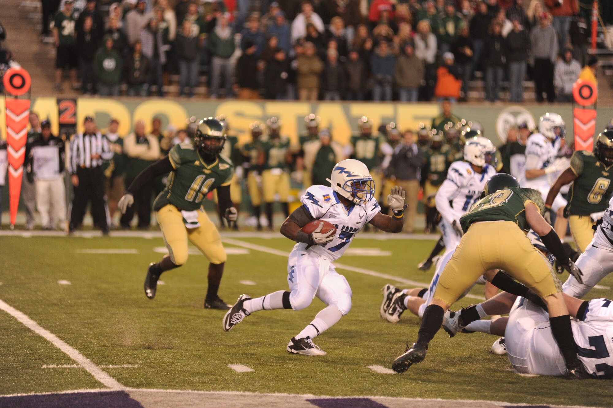 Falcons running back Asher Clark makes a cut. The senior carried 13 times for 111 yards and one touchdown, and broke 1,000 yards for his second straight season, as the Falcons beat CSU 45-21. (U.S. Air Force Photo/ John Van Winkle)