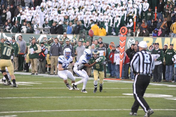 Air Force linebacker Patrick Hennessey and defensive back Josh Hall break up a pass intended for CSU wide receiver Thomas Coffman.  The Falcons defense limited CSU to only 125 yards receiving, and earned its seventh win of the season by beating CSU, 45-21. (U.S. Air Force Photo/ John Van Winkle)