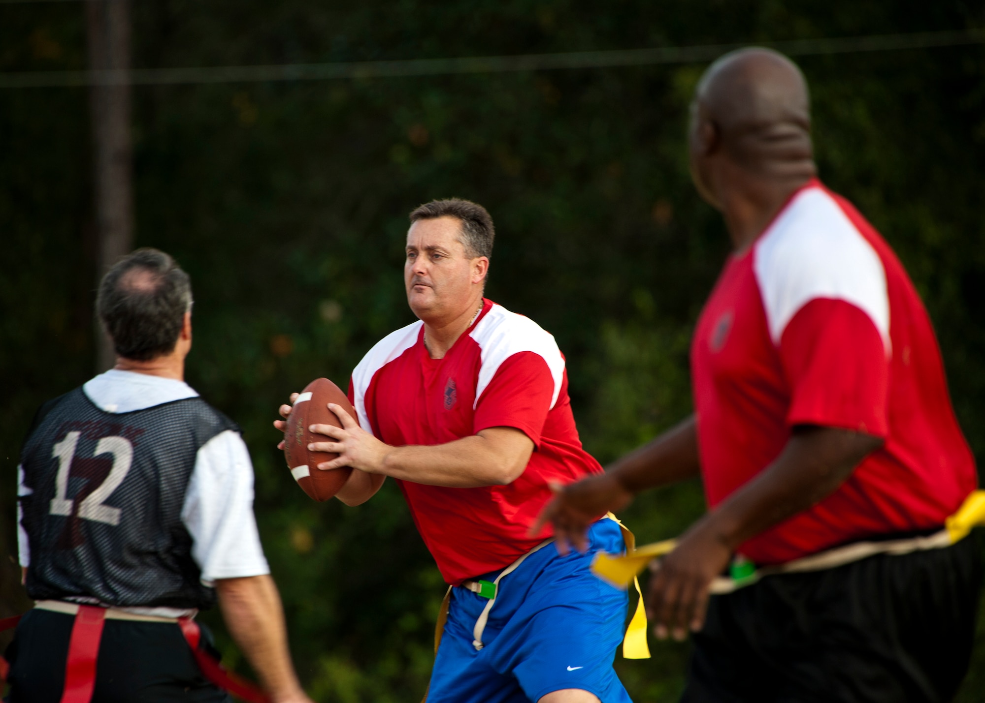 Chiefs’ quarterback, Donnie Morris, looks for an open receiver during the annual Chiefs versus Eagles football game Nov. 22 at Eglin Air Force Base, Fla.  The Eagles avenged last year’s defeat by dominating the Chiefs 35-13.  (U.S. Air Force photo/Samuel King Jr.)