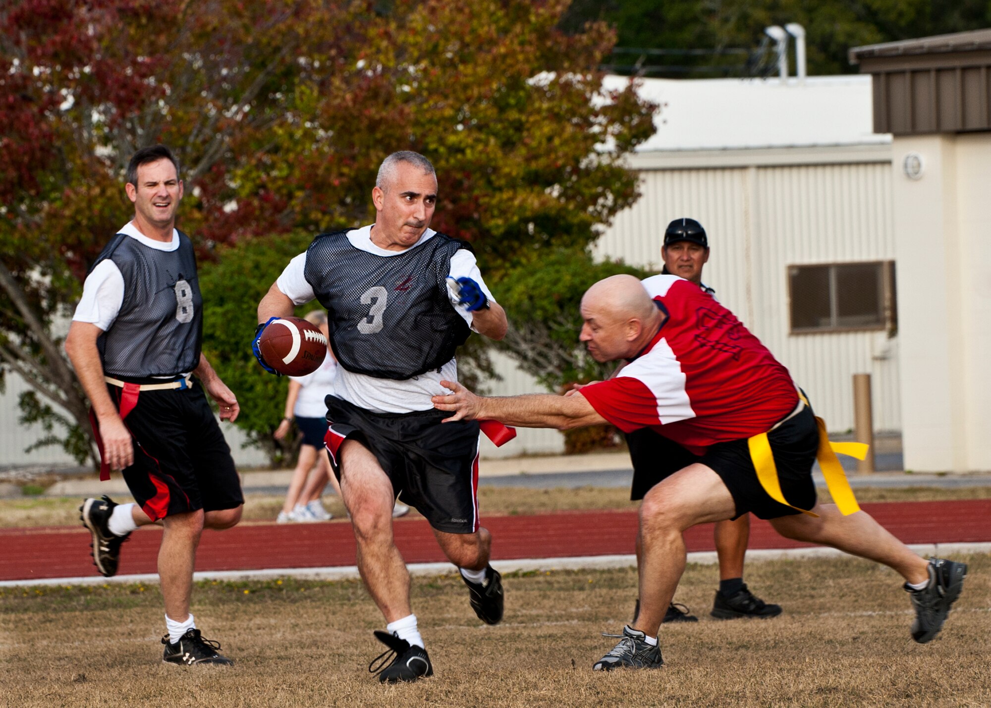 Arthur Tomassetti returns a punt during the annual Chiefs versus Eagles football game Nov. 22 at Eglin Air Force Base, Fla.  The Eagles avenged last year’s defeat by dominating the Chiefs 35-13.  (U.S. Air Force photo/Samuel King Jr.)
