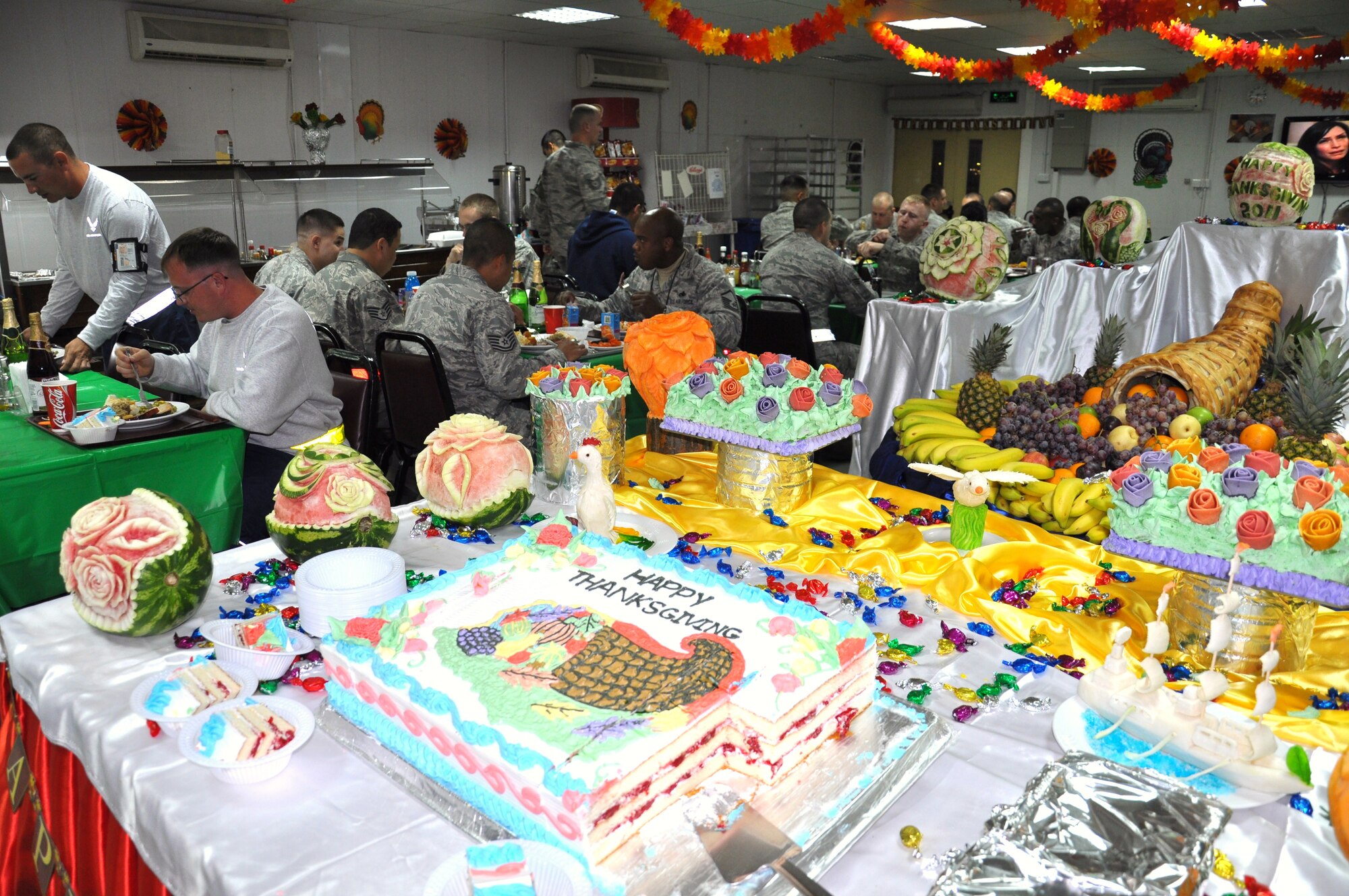 Airmen enjoy a traditional Thanksgiving meal Nov. 24 at an undisclosed location in Southwest Asia (U.S. Air Force photo by Senior Airman Rachelle Elsea)