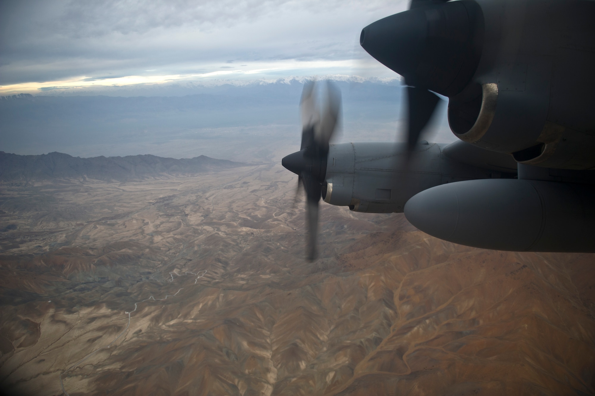 A U.S. Air Force C-130 Hercules being flown by a crew from the 774th Expeditionary Airlift Squadron departs Bagram Air Field, Afghanistan, on an airdrop mission on Nov. 23, 2011. The crew is deployed to Afghanistan from the 145th Air Wing, Air National Guard, Charlotte, N.C. (U.S. Air Force photo/Master Sgt. Jeffrey Allen)