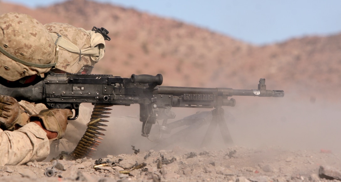 U.S. Marines with Charlie Company, 1st Battalion, 8th Marine Regiment, 2D Marine Division, conduct a company attack on range 401 aboard Marine Corps Base Twentynine Palms, Calif., Nov. 27, 2011. 1/8 is conducting Enhanced Mojave Viper training to prepare them for future deployments during Operation Enduring Freedom.