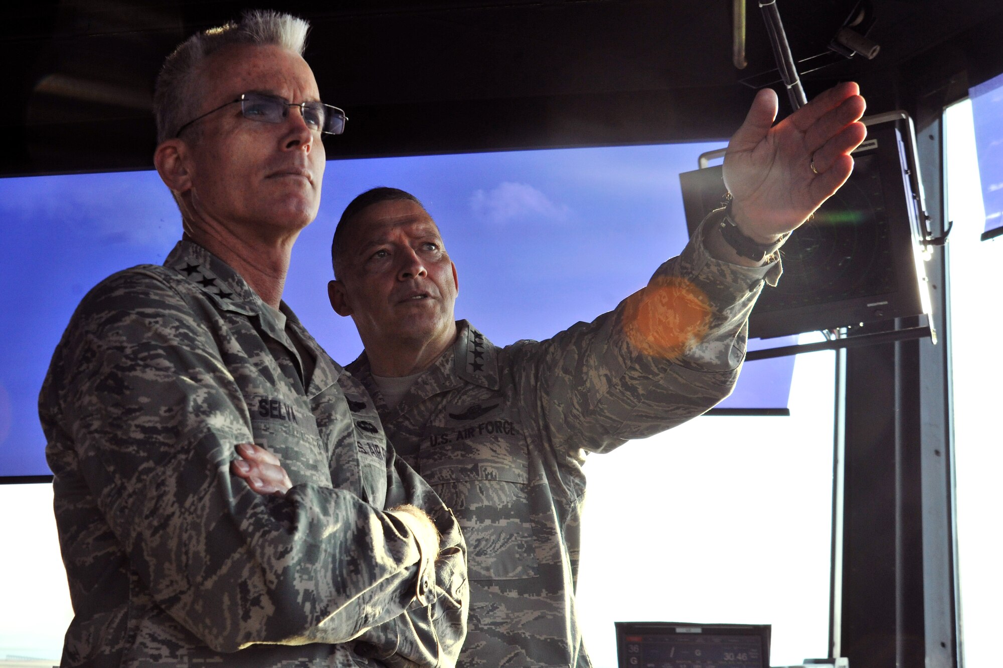 Gen. Gary North, Pacific Air Forces commander, points out key features of Kunsan Air Base, Republic of Korea, to Lt. Gen. Paul Selva, PACAF vice commander, while visiting Kunsan’s air traffic control tower, Nov. 21. The 8th Operations Support Squadron leadership briefed North and Selva on upcoming renovation projects. (U.S. Air Force photo by Senior Airman Brittany Y. Auld/Released)