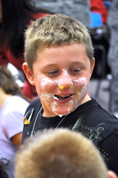 Frankie Seitz, son of Capt. Kristen Seitz with the 71st Medical Group at Vance Air Force Base, Okla., won third place in the pie eating contest during the Month of the Military Family celebration Nov. 18 in the Community Chapel Activity Center. More than 140 folks attended the celebration, which included Home-Front-Hero medals presented to 38 children of 16 deployed Vance Airmen. The Month of the Military Family recognizes what families of military members go through when their loved ones are away from home serving their country. (U.S. Air Force photo/ Airman 1st Class Frank John Casciotta)
