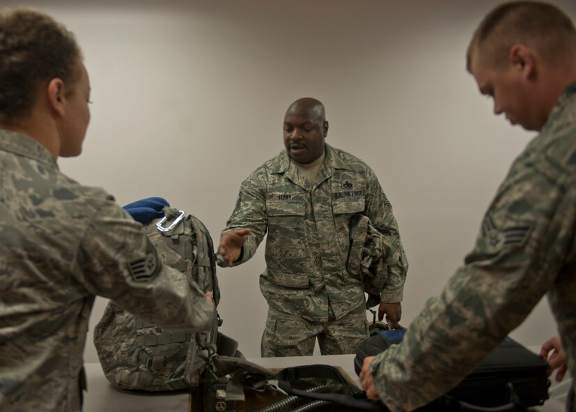 U.S. Air Force Senior Master Sgt. Keith Terry, 723rd Aircraft Maintenance Squadron, processes through a deployment line with the 23rd Logistics Readiness Squadron prior to boarding an aircraft at the Deployment Control Center, Moody Air Force Base, GA., Nov. 23, 2011. Terry was a part of the many units that left for Afghanistan a day before Thanksgiving to support Operation Enduring Freedom. (U.S. Air Force photo by Senior Airman Eileen Meier/Released)  