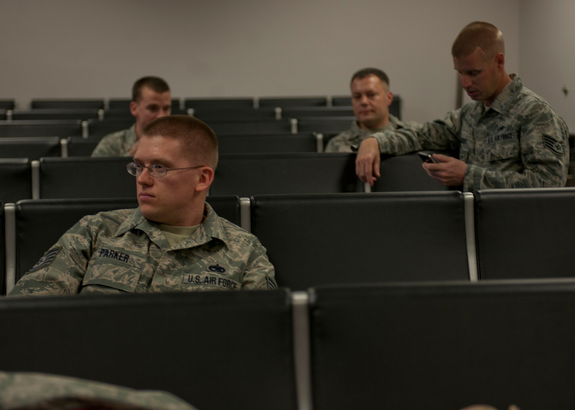 U.S. Air Force members from various units gather at the Deployment Control Center preparing to deploy from at Moody Air Force Base, Ga., Nov. 23, 2011. The Airmen left a day before Thanksgiving to Afghanistan where they will provide support for Operation Enduring Freedom. The DCC was their final processing and waiting location before boarding an aircraft for departure. (U.S. Air Force photo by Senior Airman Eileen Meier/Released)