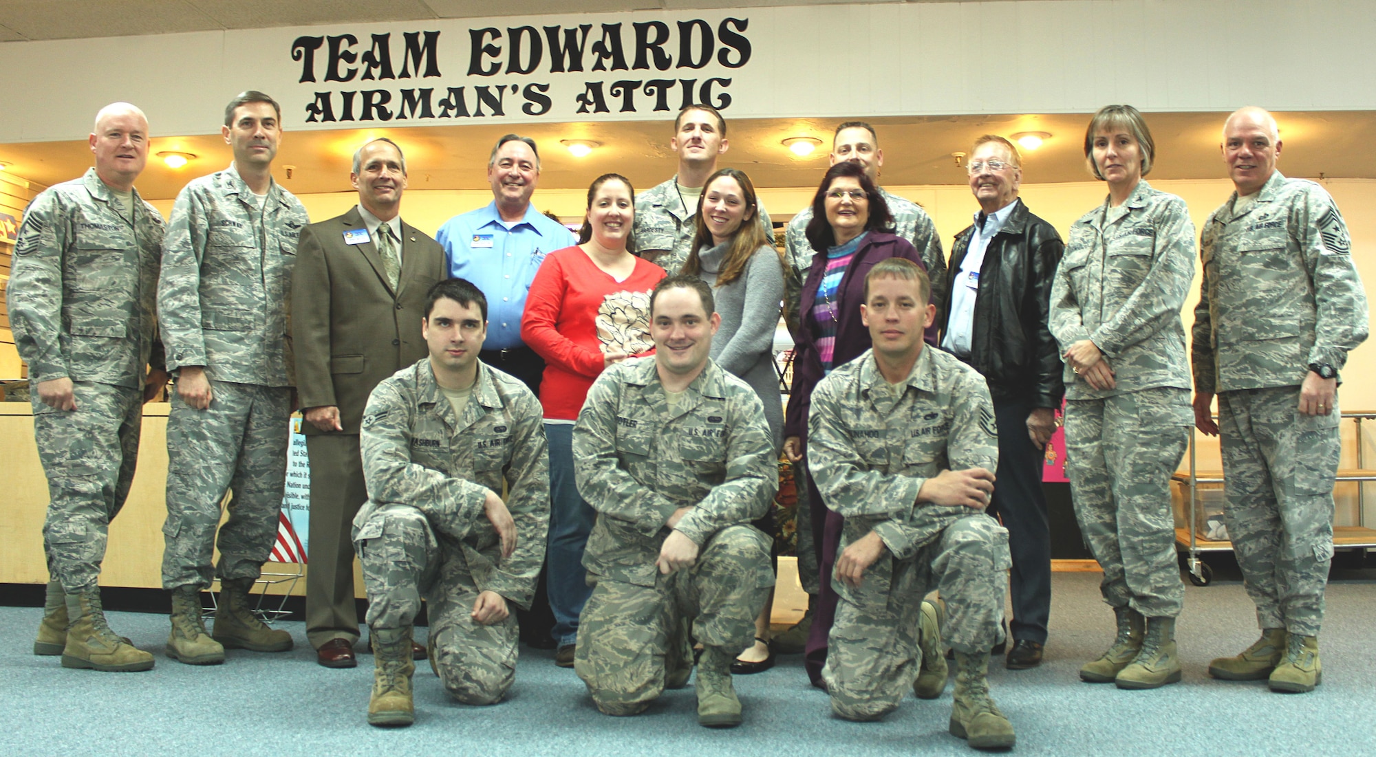 Team Edwards' military community came together with members of the Edwards AFB Civilian Military Support Group Nov. 22 to celebrate completion of a two-year project at the Airman's Attic here. The Civ-Mil raised more than $15,000 to install new carpet in the facility, an accomplishment completed with volunteer work from members across the base. (U.S. Air Force Photo by Meredith Mingledorff) 


 
