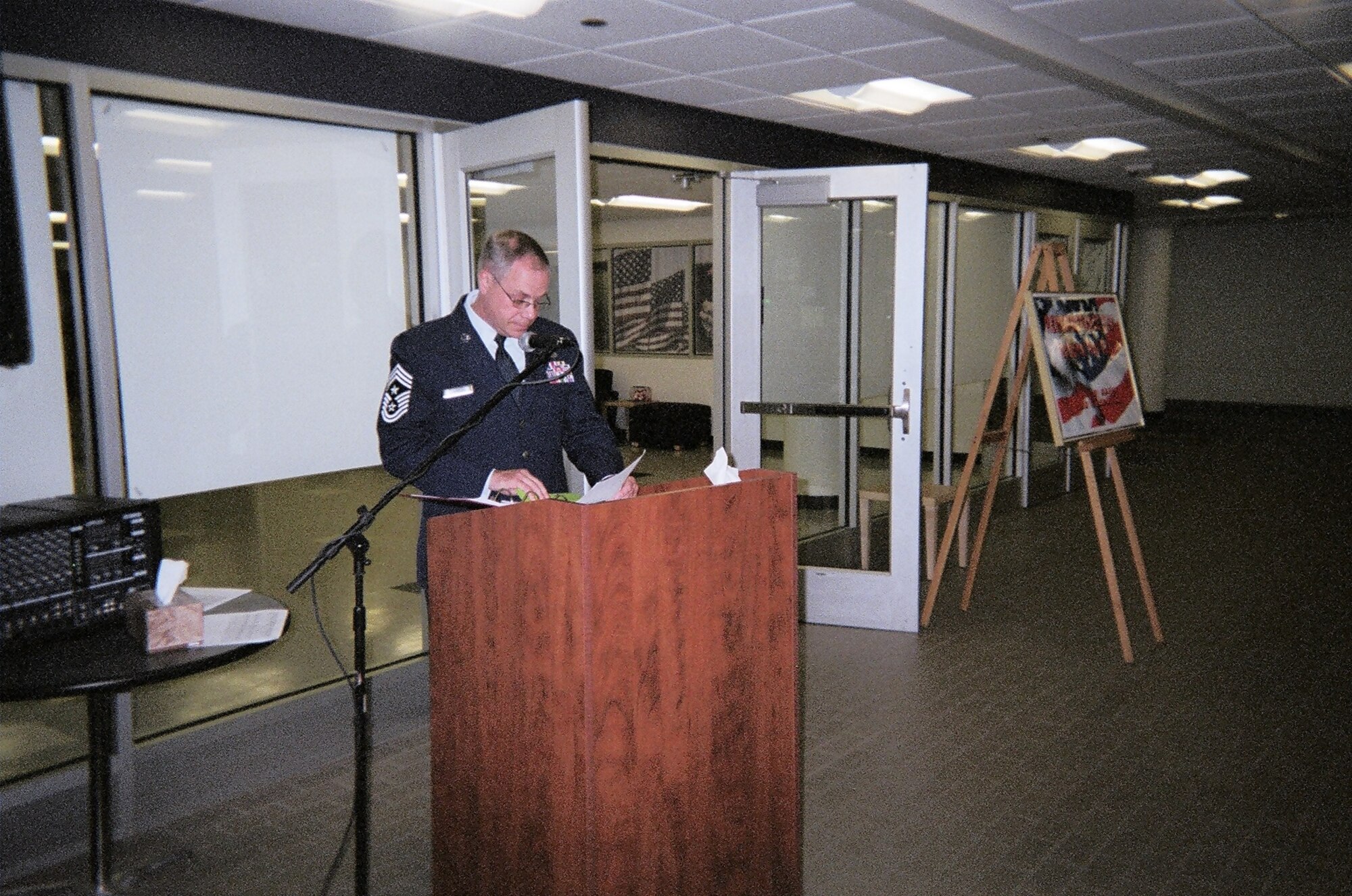 914th Airlift Wing Command Chief Master Sgt. Scott Scharlau reads names of those servicemembers killed in Operation Enduring Freedom and Operation Iraqi Freedom. The Objective of the National Roll Call is to have a synchronized reading of all the names of the Operation Enduring Freedom and Operation Iraqi Freedom casualties with all participating schools observing a pause at 11:00 a.m. Pacific Standard Time to observe a simultaneous “minute of silence” across the nation. (Courtesy Photo)