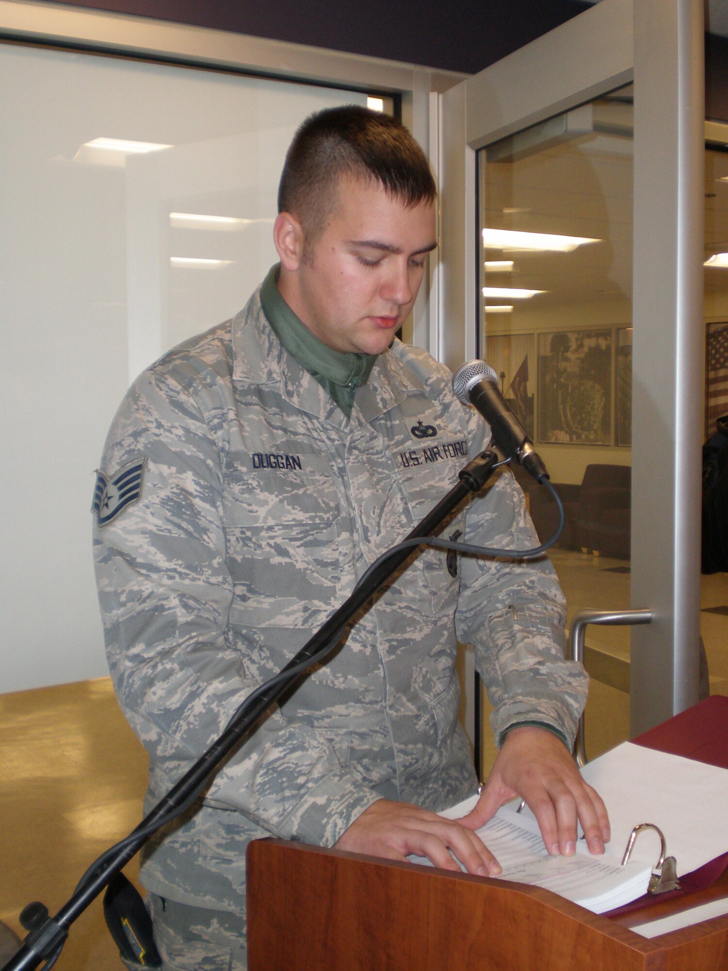 Staff Sgt. Derek Duggan of the 914th Airlift Wing Secruity Forces Squadron reads names of those servicemembers killed in Operation Enduring Freedom and Operation Iraqi Freedom. Airmen from the Niagara Falls Air Reserve Station and Niagara University participated in Remembrance Day National Roll Call on Veterans Day this year.