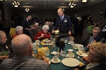 MINOT AIR FORCE BASE, N.D. -- Col. S.L. Davis, 91st Missile Wing commander, serves Team Minot senior citizens as part of the annual Day of Love event held at the Jimmy Doolittle Center here, Nov. 24. The Day of Love celebration began in 1969 as a function to provide for the senior citizens, and to involve base personnel who were away from their families, in a celebration of Thanksgiving. (U.S. Air Force photo/ Senior Airman Jessica McConnell)