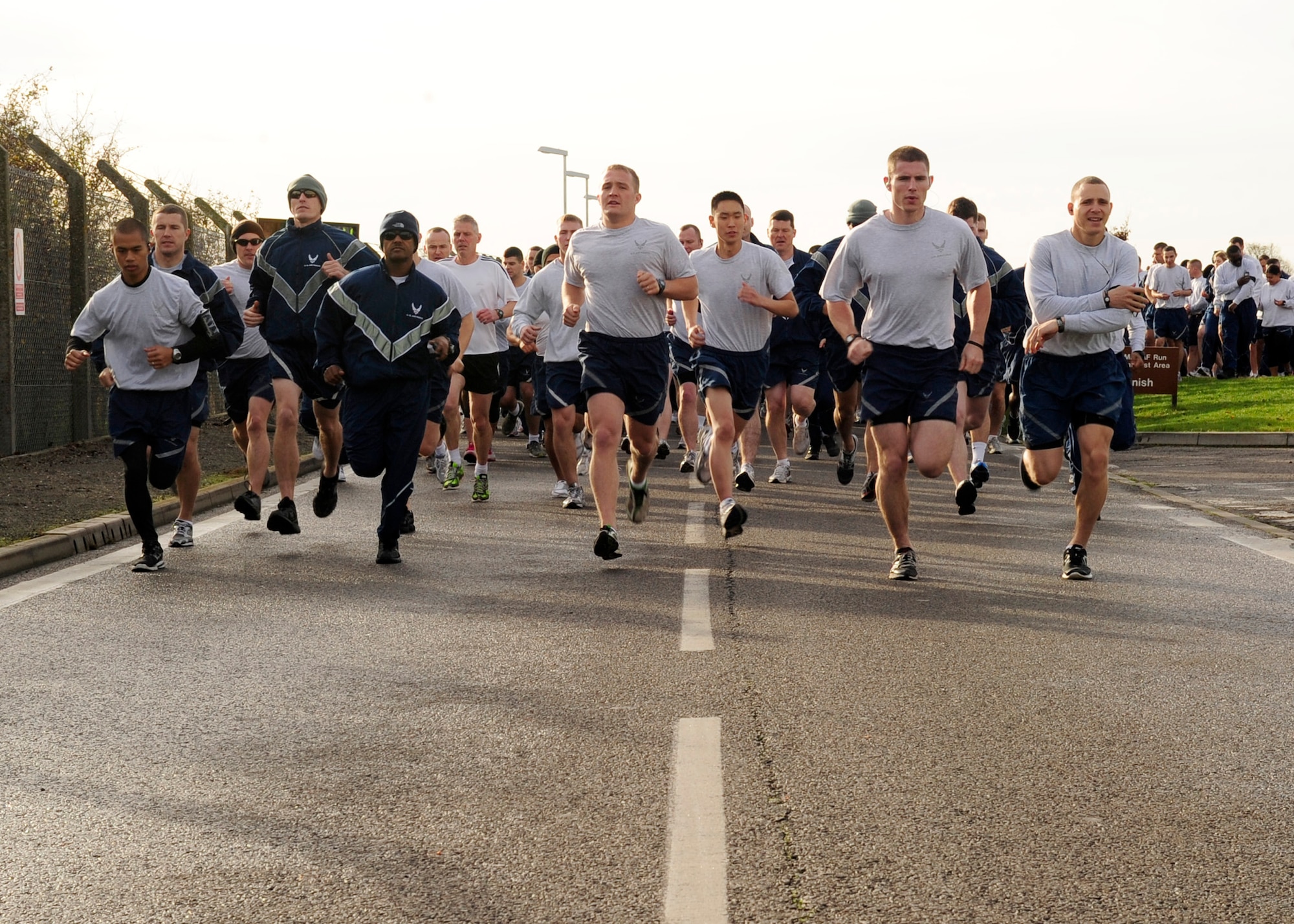 RAF MILDENHALL, England – Team Mildenhall members take off at the beginning of a 5K run here Nov. 23, 2011. The run was held prior to Thanksgiving Day and the winners of the run received coupons for free turkeys. (U.S. Air Force photo/Senior Airman Ethan Morgan)
