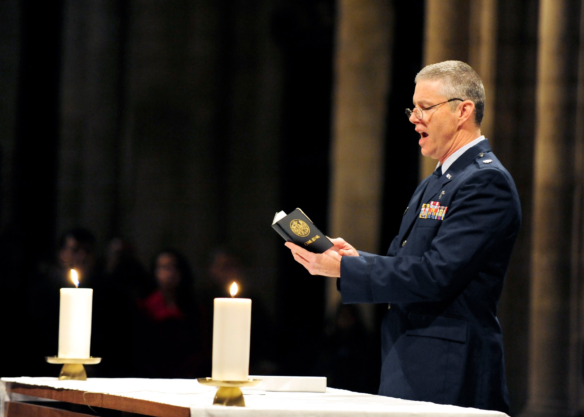 RAF MILDENHALL, England – Chaplain (Lt. Col.) Henry Close, 100th Air Refueling Wing chaplain, gives the final blessing during the Thanksgiving service at Ely Cathedral Nov. 23, 2011. The cathedral was built by William the Conqueror as a prominent outpost after the bloody and lengthy rebellion by Hereward the Wake. (U.S. Air Force photo/Senior Airman Ethan Morgan)