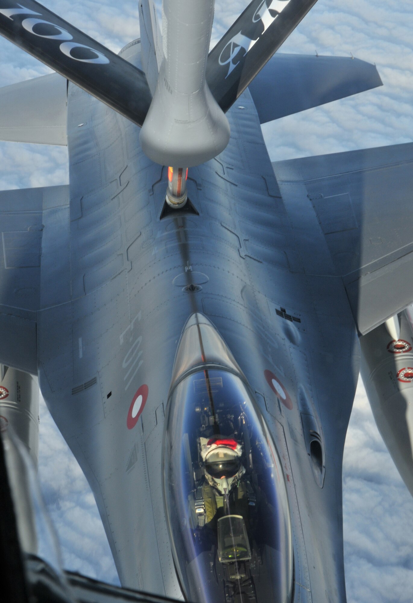 RAF MILDENHALL, England – An air-to-air refueling mission took a special Christmas turn as one Royal Danish Air Force F-16 Fighting Falcon ‘sleigh’ pilot arrived to receive fuel with a Santa Claus hat taped to his helmet. RAF Mildenhall’s 351st Air Refueling Squadron KC-135 Stratotankers are responsible for refueling American and allied aircraft, enabling NATO missions across Europe and Africa. Transient aircraft supporting ongoing operations in Afghanistan and other deployed areas also frequently rendezvous with Mildenhall tankers to receive fuel, which extends their global reach and enables the Air Force mission to fly, fight and win. (U.S. Air Force photo/Tech. Sgt. Kevin Wallace) 