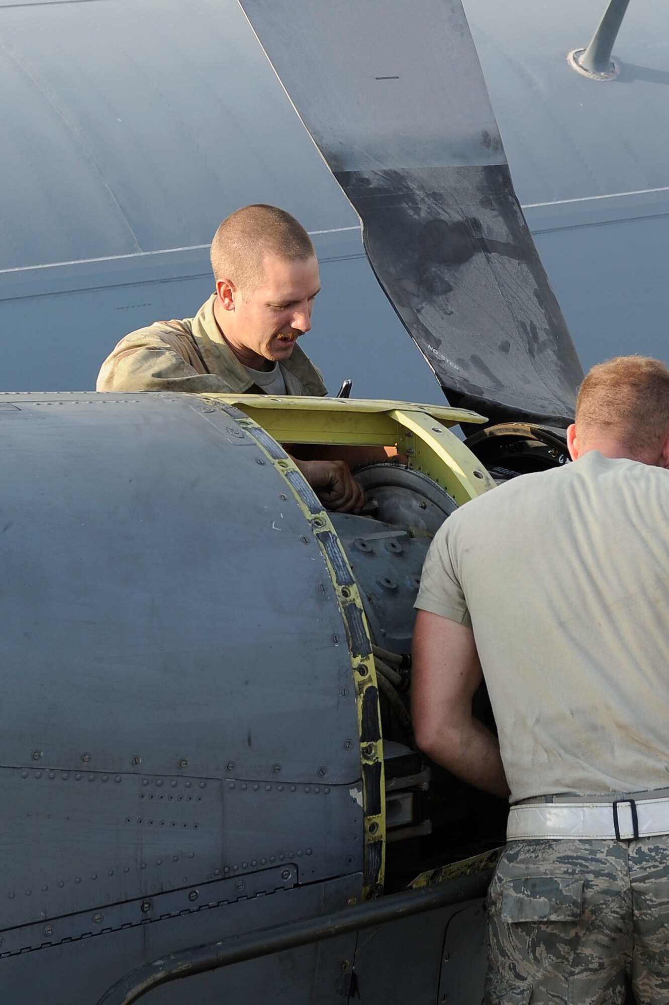 BAGRAM AIRFIELD, Afghanistan – Staff Sgt. Brandon Bell, 455th  Expeditionary Aircraft Maintenance Squadron aerospace propulsion craftsman, conducts an inspection on an EC-130H Compass Call propeller Nov. 23, 2011. Bell, who hails from Plano, Texas, is stationed at Davis-Monthan Air Force Base, Ariz. (U.S. Air Force photo/ Senior Airman Krista Rose)