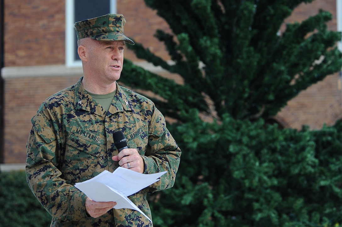 Col. Paul D. Montanus, Marine Barracks Washington commanding officer, speaks to Marines during the 2011 Commander’s Cup award ceremony here Nov. 28. The Commander’s Cup was comprised of 14 competitions throughout the year testing the Marines’ military knowledge, marksmanship, competitiveness and physical and mental discipline.