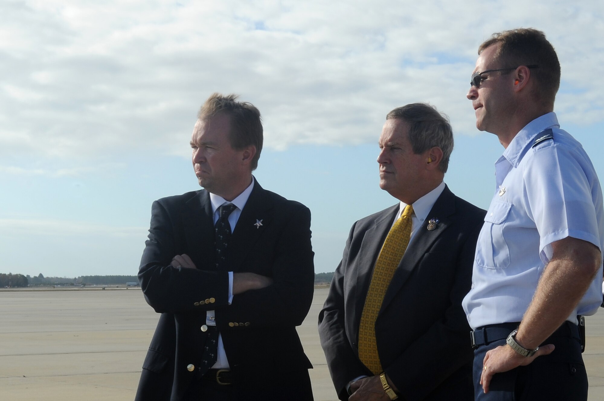 (From Left) Congressional members John Mulvaney, Joe Wilson, and U.S. Air Force Col. James Sears, 20th Operations Group commander, listen to a briefing before the F-16 Demo Team practice at Shaw Air Force Base, S.C., Nov. 28, 2011. Congressional leaders visited the base to better understand base operations, lifestyle, and the mission of Shaw which all Airmen and civilians make possible. (U.S. Air Force photo by Airman First Class Hunter Brady/Released)


