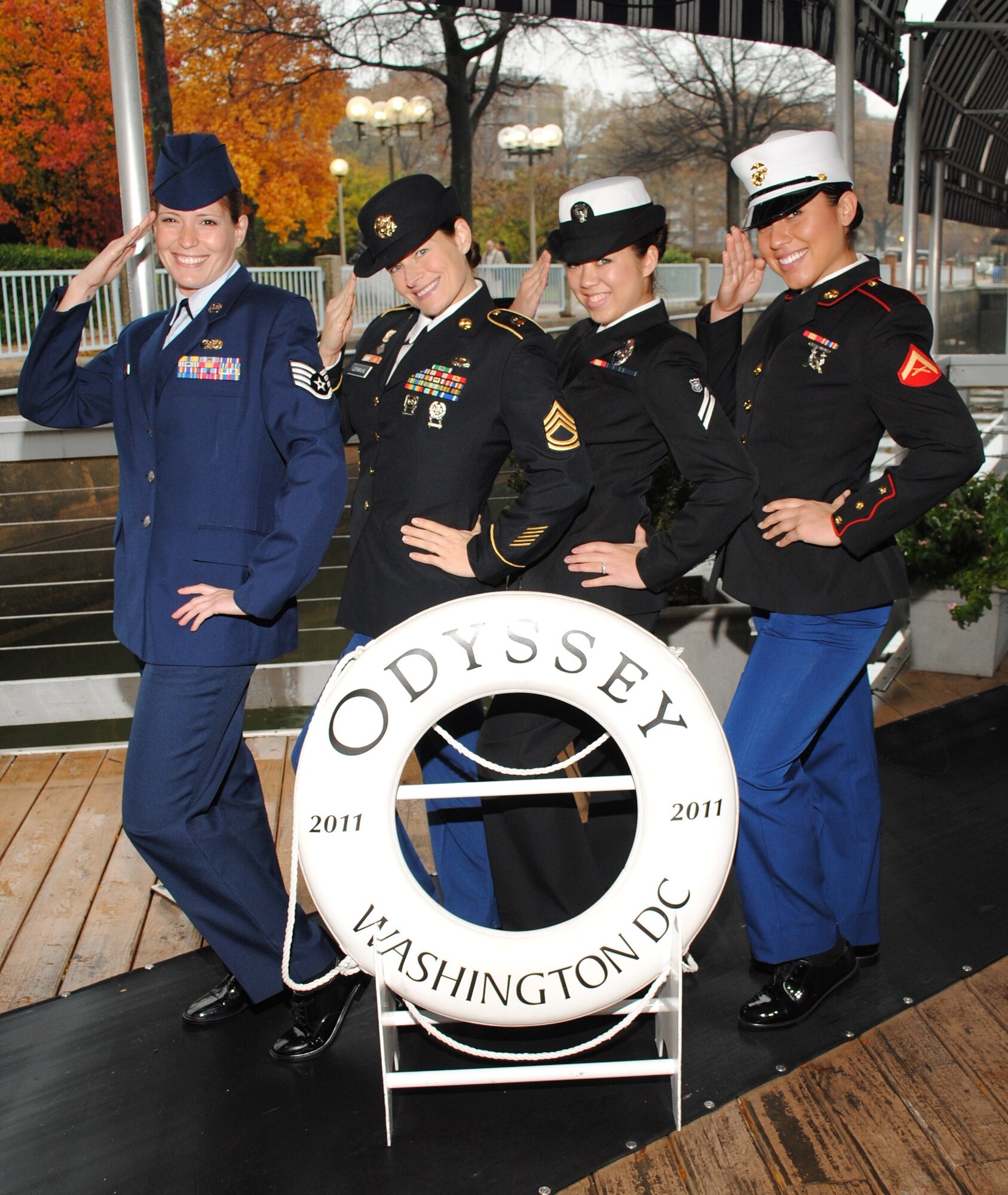 Patriot Day volunteers strike a pose Nov. 22 in front of the Odyssey cruise ship, Washington, D.C. The servicemembers served as hosts on the cruise down the Potomac River, greeting and entertaining the veterans, Wounded Warriors and single Soldiers celebrating Thanksgiving aboard the ship. (Photo compliments of Odyssey Cruises)