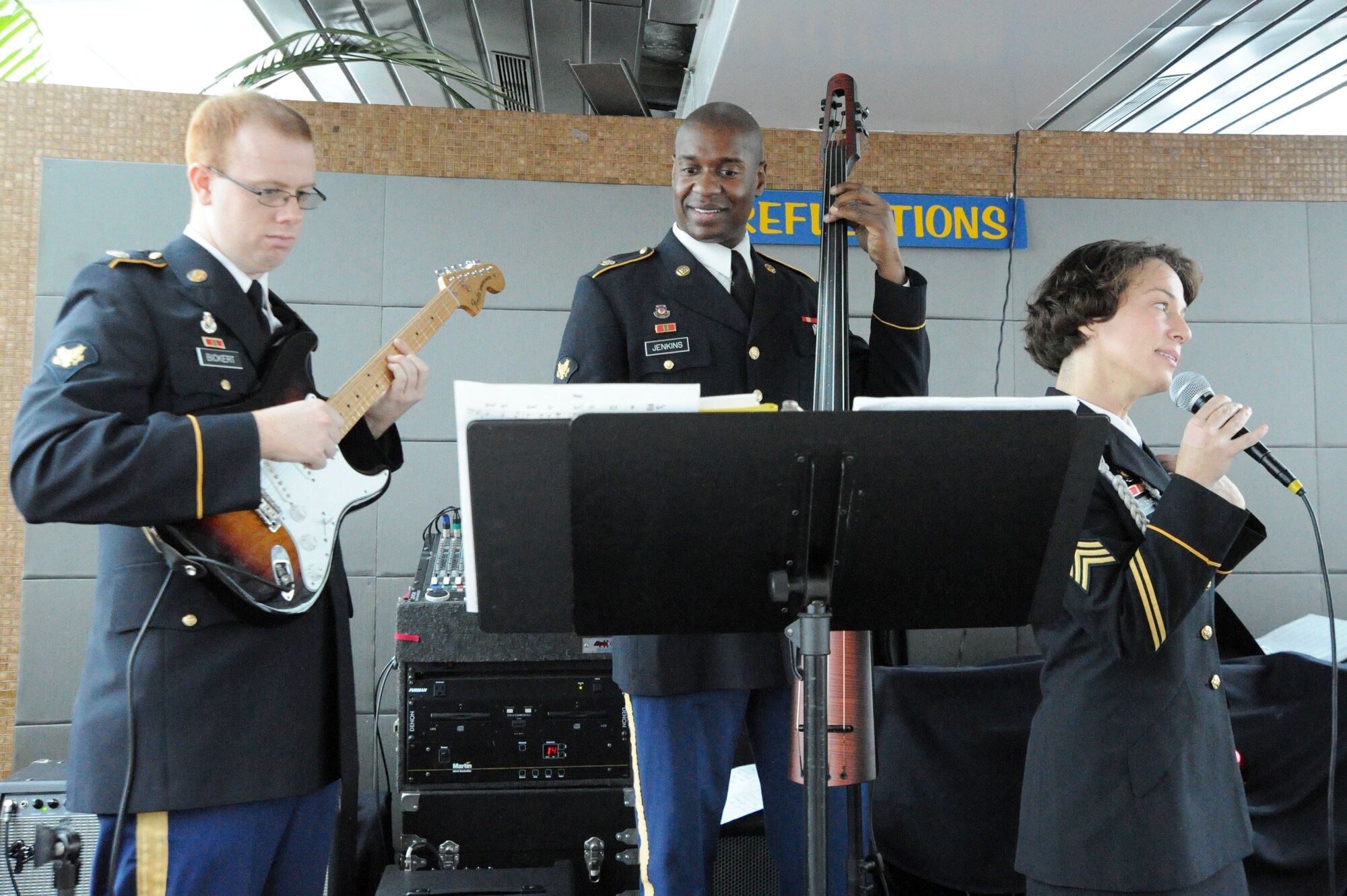 The Army Service Band entertains Veterans Nov. 22 aboard the Odyssey Patriot Day cruise, Washington, D.C. The Potomac River cruise provided dinner and dancing to veterans, Wounded Warriors and single Soldiers to celebrate Thanksgiving. (U.S. Air Force photo by Airman 1st Class Tabitha N. Haynes)