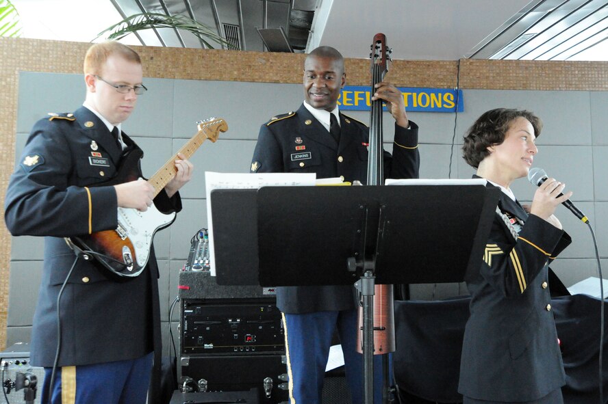 The Army Service Band entertains Veterans Nov. 22 aboard the Odyssey Patriot Day cruise, Washington, D.C. The Potomac River cruise provided dinner and dancing to veterans, Wounded Warriors and single Soldiers to celebrate Thanksgiving. (U.S. Air Force photo by Airman 1st Class Tabitha N. Haynes)