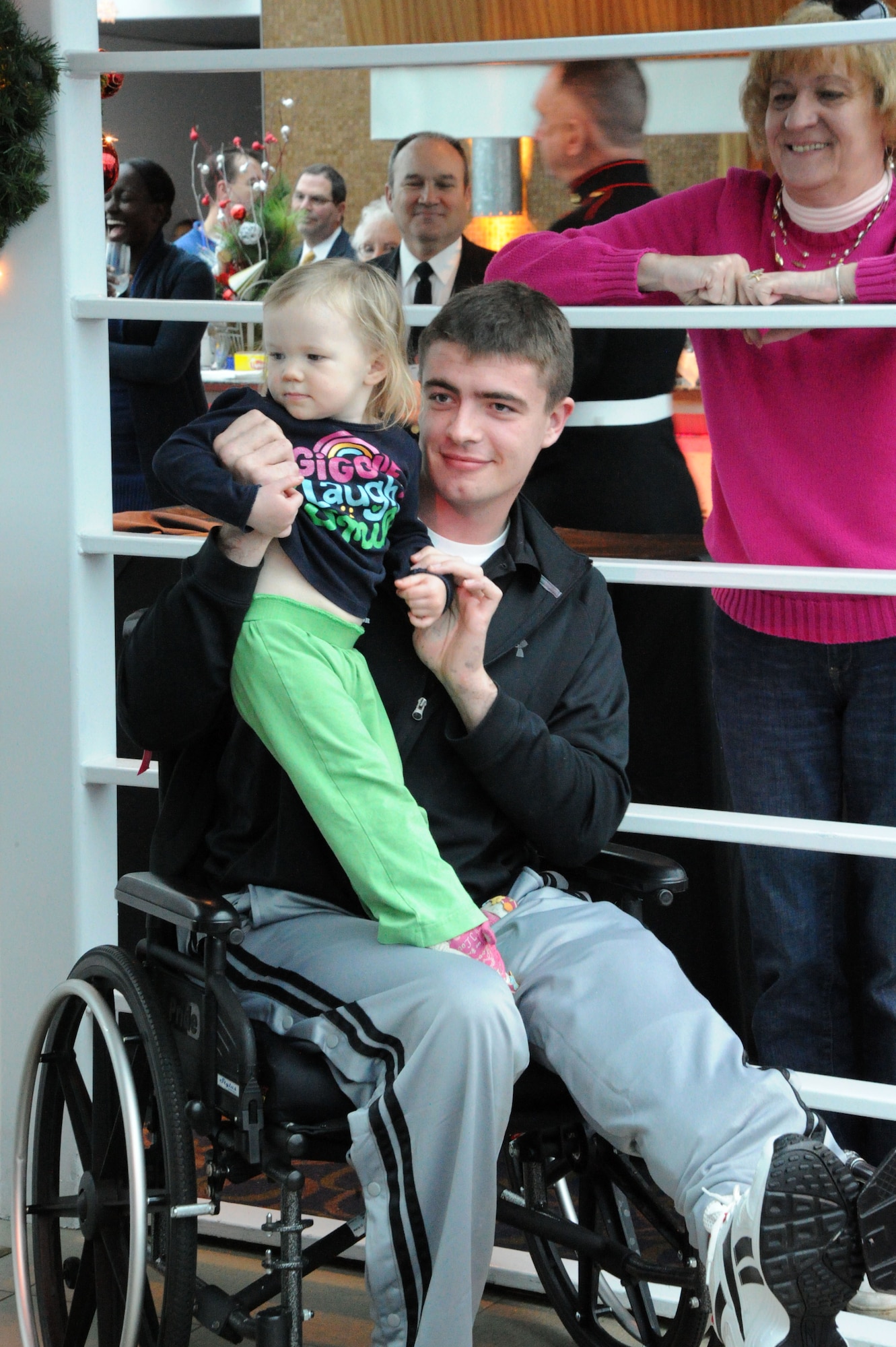 Lance Cpl. Mark Lang, 210 2nd Marine Division, Camp Lejeune, N.C., dances with Arionna Hackett Nov. 22 aboard the Odyssey Patriot Day cruise, Washington, D.C. The Potomac River cruise provided dinner and dancing to veterans, Wounded Warriors and single Soldiers to celebrate Thanksgiving. (U.S. Air Force photo by Airman 1st Class Tabitha N. Haynes)
