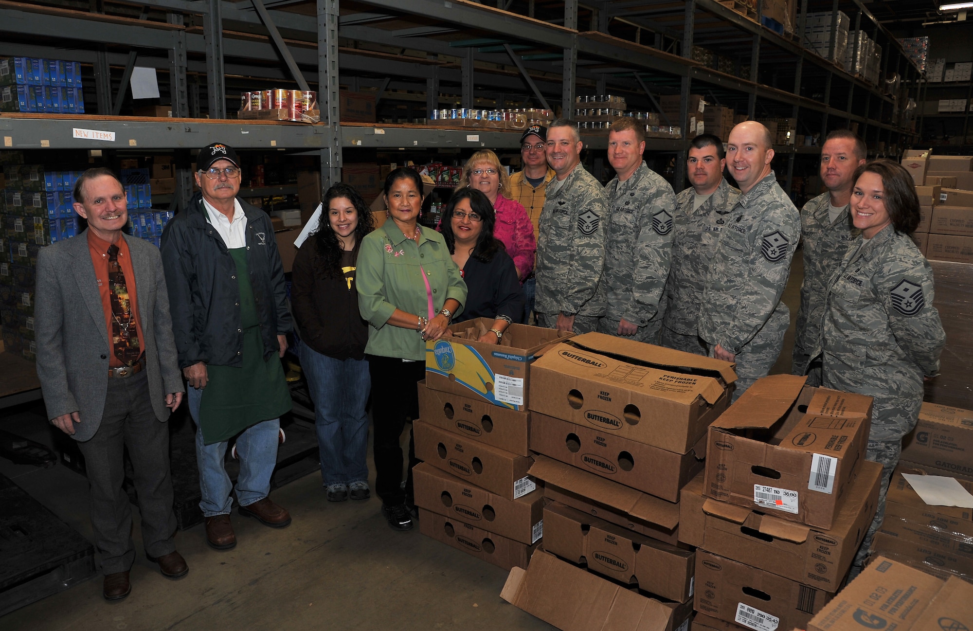 GOODFELLOW AIR FORCE BASE, Texas -- The First Sergeants Council teams up with the Commissary for Operation Warmheart Nov. 22. First sergeants and members of Team Goodfellow collected $1,300 and more than 1.5 tons of food. (U.S Air Force photo/Airman 1st Class Michael Smith)