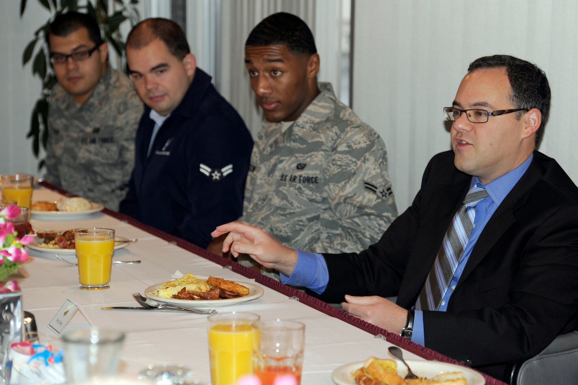 MISAWA AIR BASE, Japan - Daniel B. Ginsberg, Assistant Secretary of the Air Force for Manpower and Reserve Affairs, talks with airmen during his visit here Nov. 28. Ginsberg stopped at Misawa Air Base to visit base facilities and to thank the Misawa community for their efforts during Operation Tomodachi. (U.S. Air Force photo/Tech. Sgt. Marie Brown)