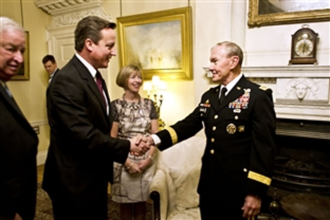 U.S. Army Gen. Martin E. Dempsey, chairman of the Joint Chiefs of Staff, meets British Prime Minister David Cameron in London, Nov. 28, 2011.  