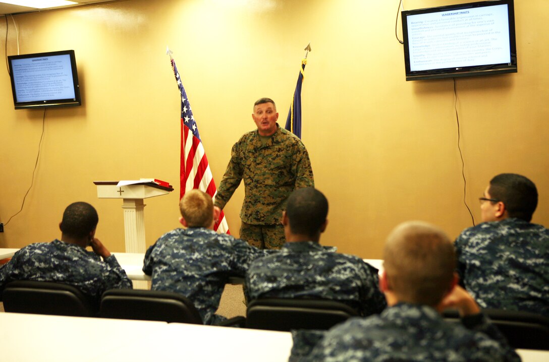 Sgt. Maj. Herbert W. Wrench, the 2nd Marine Logistics Group sergeant major, teaches a period of military education at the 2nd MLG Chaplain Center aboard Camp Lejeune, N.C., Nov. 30, 2011. During the PME, sailors with the religious ministry teams in the unit learned the Marine Corps leadership traits and principles. (U.S. Marine Corps photo by. Pfc. Franklin E. Mercado)