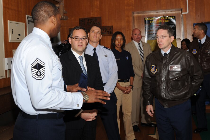 Senior Master Sgt. Victor Mack, 35th Force Support Squadron, Sustainment Services Flight superintendent, (left), talks about the Potter Fitness Center with Daniel B. Ginsberg, Assistant Secretary of the Air Force for Manpower and Reserve Affairs, here Nov. 28, 2011. The fitness center was built in the 1950s, making it the oldest gym at a Pacific Air Forces base. Ginsberg toured the base and expressed his gratitude to the Misawa community for their efforts during Operation Tomodachi. (U.S. Air Force photo/ Airman Kenna Jackson)