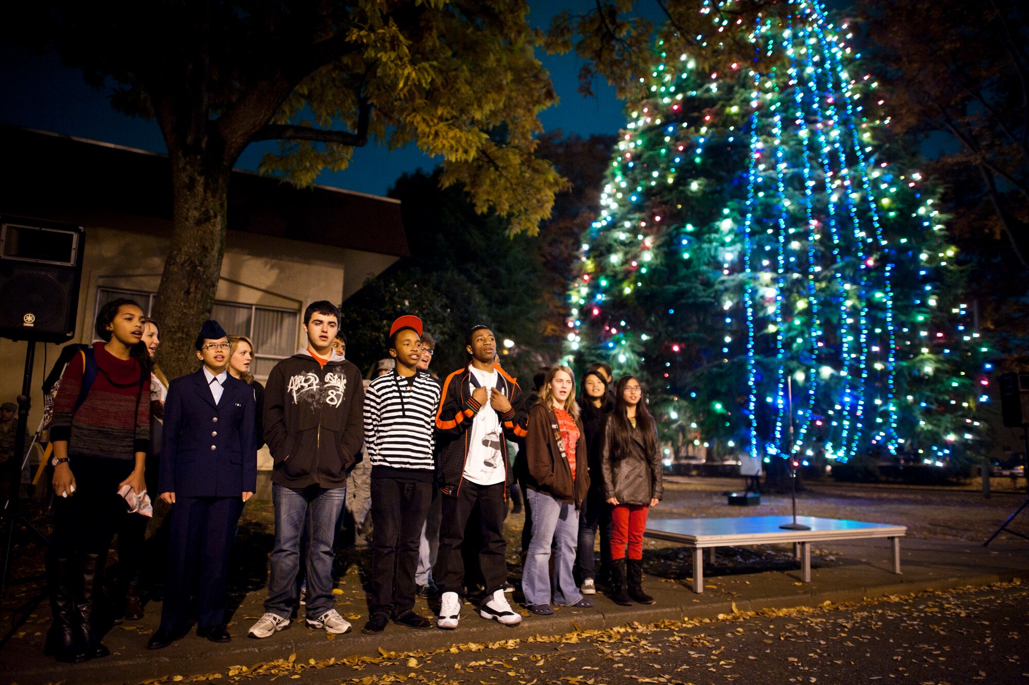 YOKOTA AIR BASE, Japan -- The Yokota High School choir sings carols at the annual tree lighting ceremony Nov. 30, 2011, at Yokota Air Base, Japan. (U.S. Air Force photo/Staff Sgt. Samuel Morse)