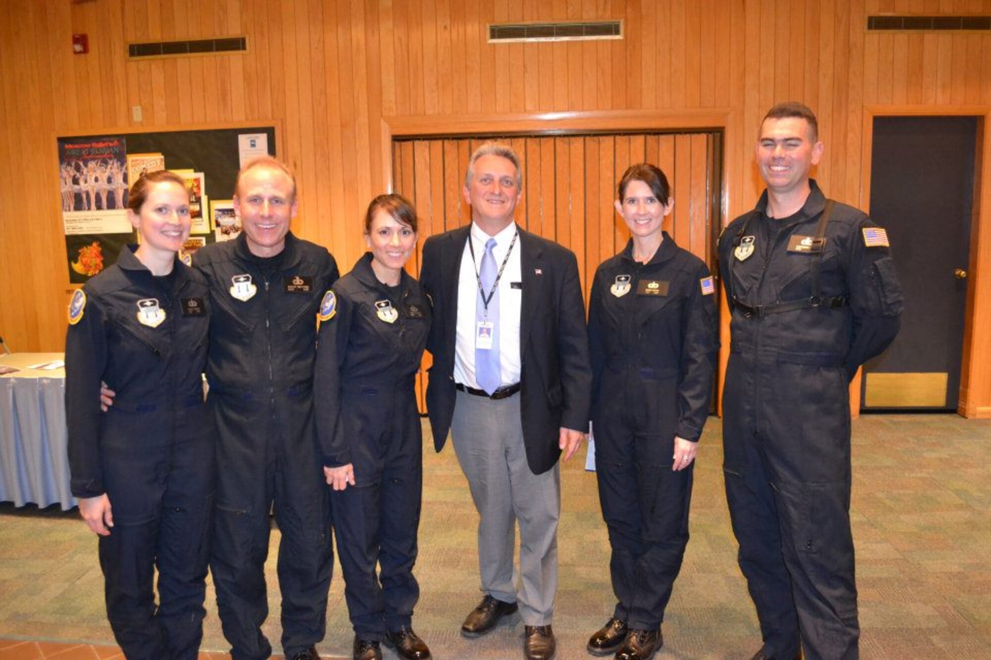The Academy Winds from the United States Air Force Academy Band performed in Farmington, NM, during an eight day tour of the Land of Enchantment. John Elchert, publisher of the Farmington Daily Times and sponsor of this event, poses with Academy Winds after a sold-out, standing ovation performance in Farmington.