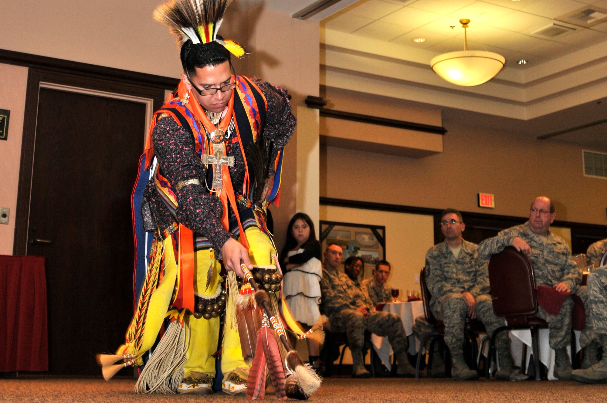 Tech. Sgt. Thundercloud Hirajeta performs a southern plains war dance during the Native American Heritage Month luncheon at the Recce Point Club Beale Air Force Base, Calif. Nov 29, 2011.  Hirajeta gave a description about the style of dance he was performing as well as the symbolic nature of his regalia. (U.S. Air Force photo by Staff Sgt. Jeremy McGuffin/Released)