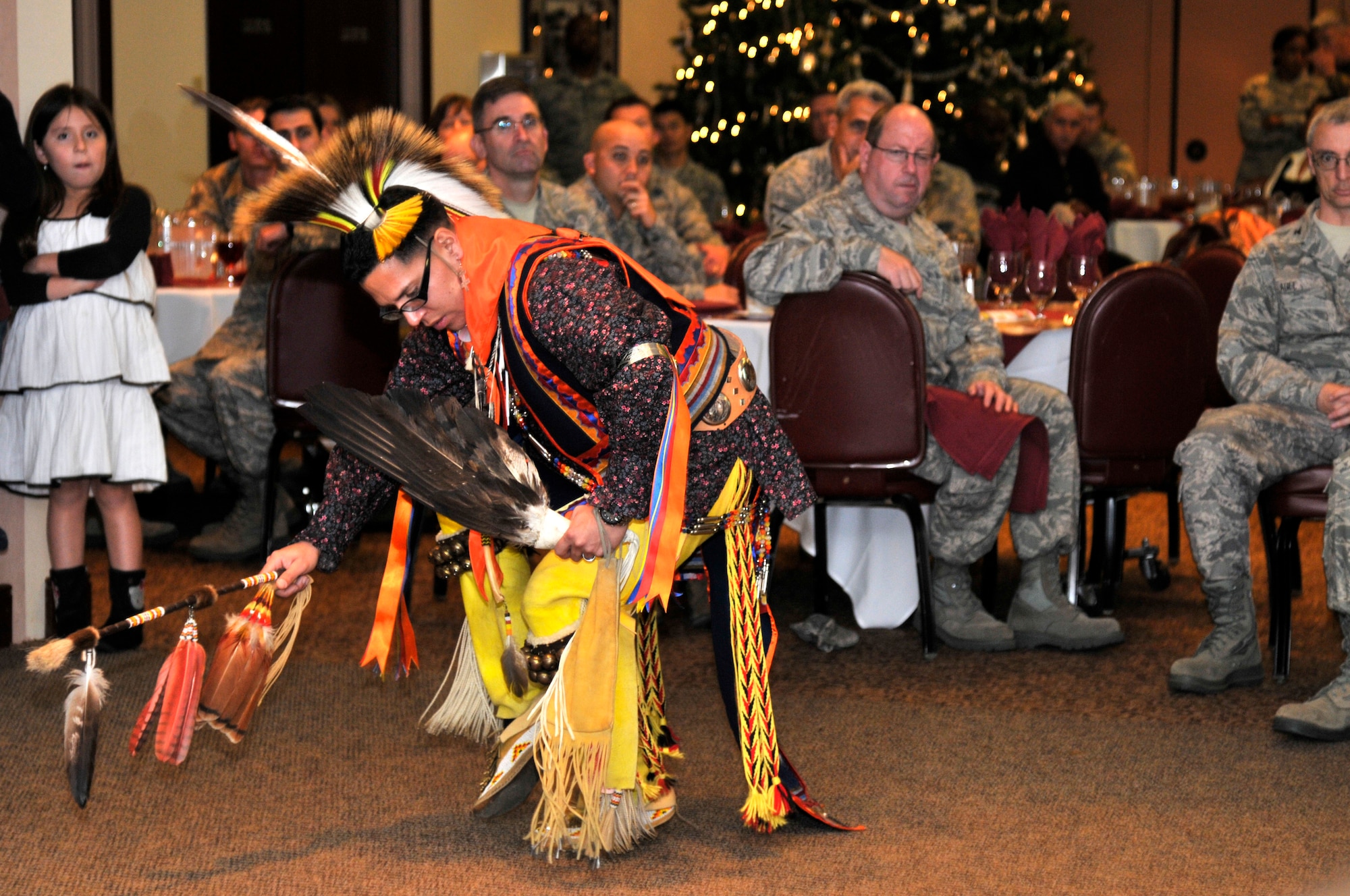 Tech. Sgt. Thundercloud Hirajeta performs a southern plains war dance during the Native American Heritage Month luncheon at the Recce Point Club Beale Air Force Base, Calif. Nov 29, 2011  Hirajeta is representing the Comanche people. (U.S. Air Force photo by Staff Sgt. Jeremy McGuffin/Released)