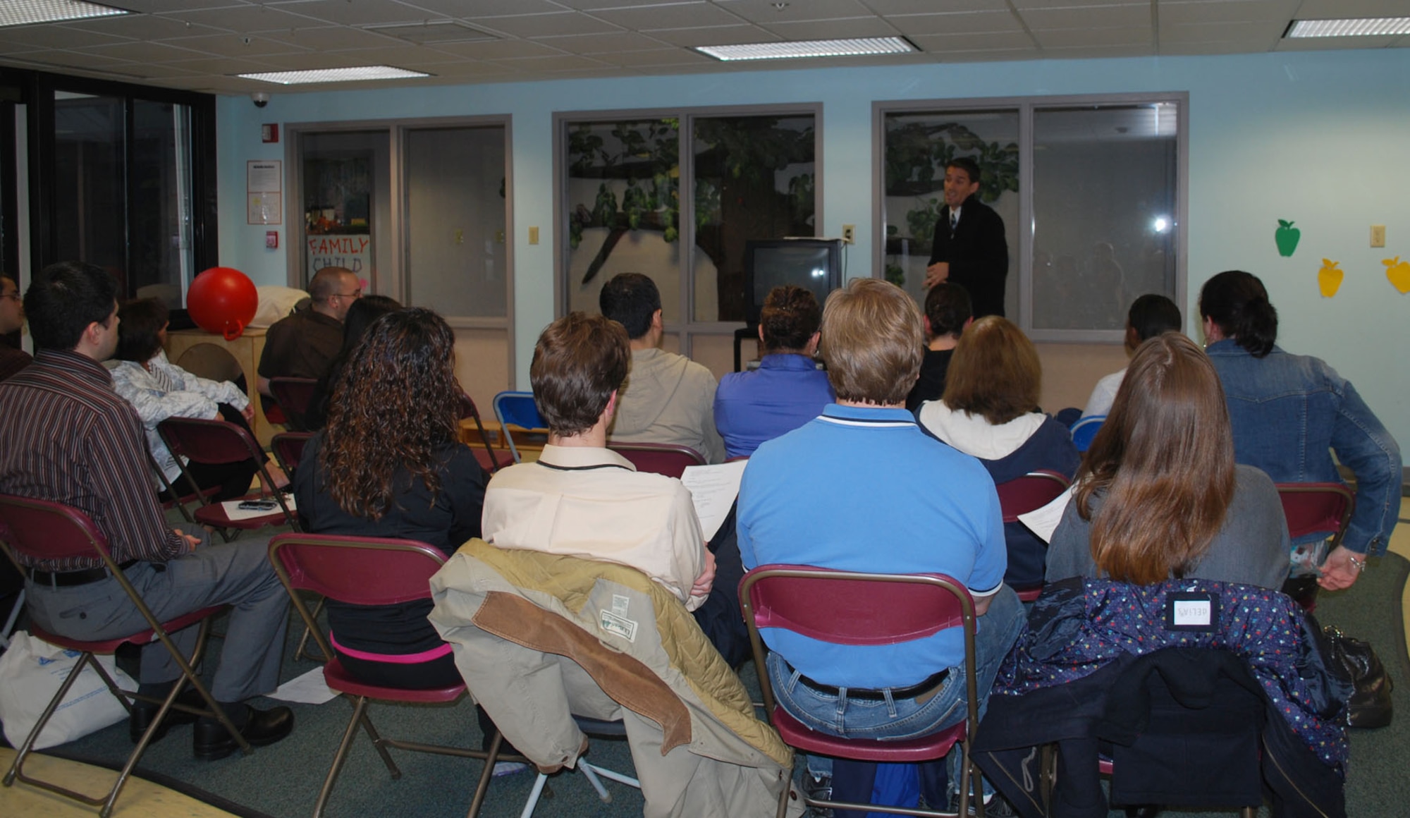 HANSCOM AIR FORCE BASE, Mass. - Matt Nicoli, of the Family Advocacy Program (FAP), recently speaks to parents at the Child Development Center (CDC) about 1-2-3 Magic, an effective discipline program for children ages 2 to 12. The CDC and FAP are partnering to offer a quarterly Family Learning Series available to all military families. For more information about the Family Learning Series or other programs offered by FAP, call 781-377-4617. (Courtesy photo)